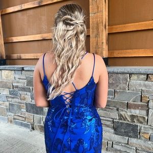 Royal blue prom dress worn once has tons of sequins and a beautiful back